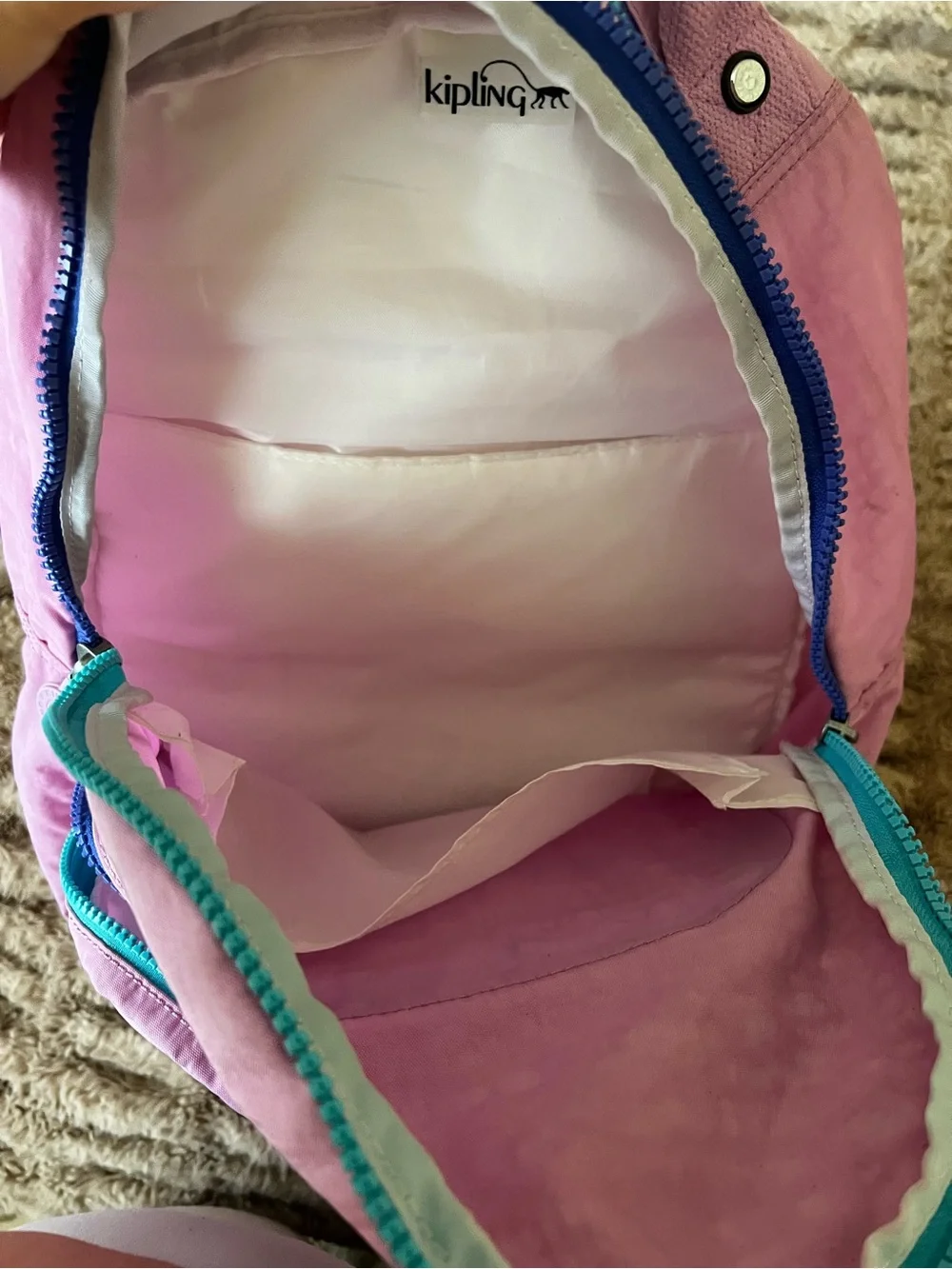 Kipling Pink standard Backpack with Teal and Purple Accents